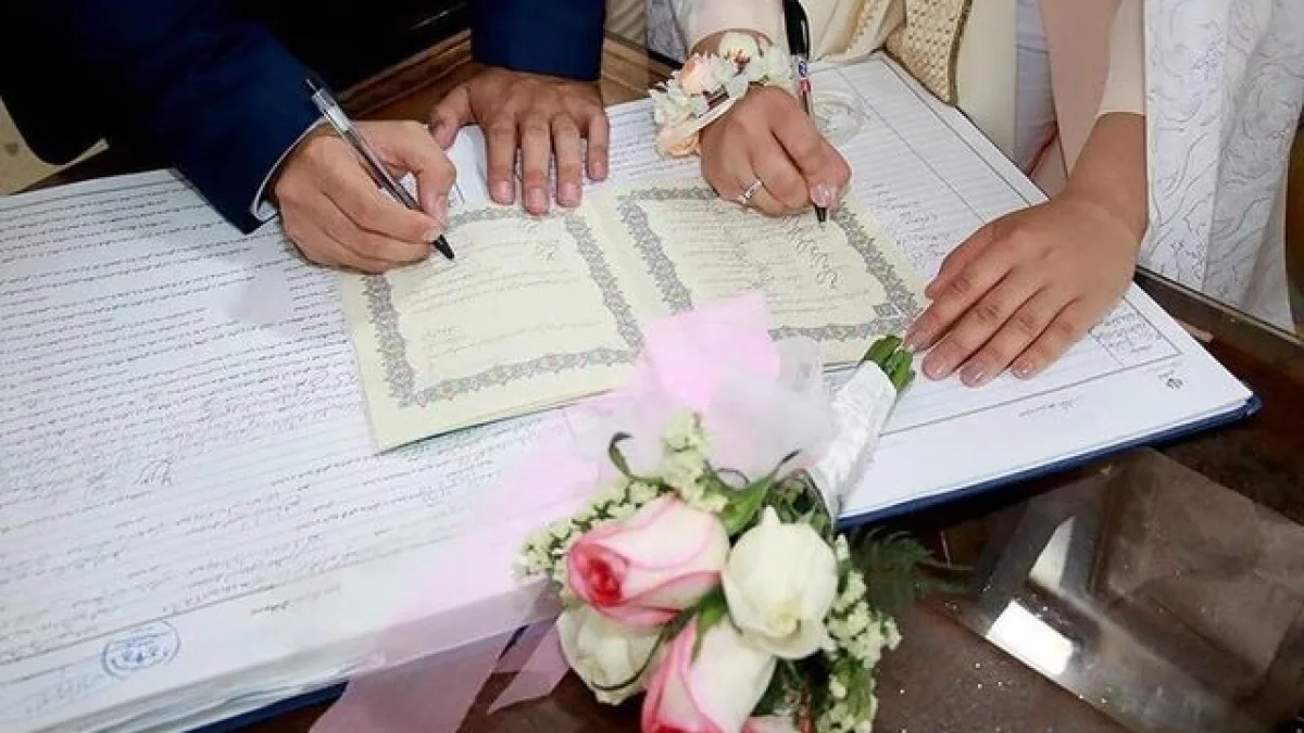زوجین در دفتر ثبت ازدواج گرجستان ۲۰۲۶